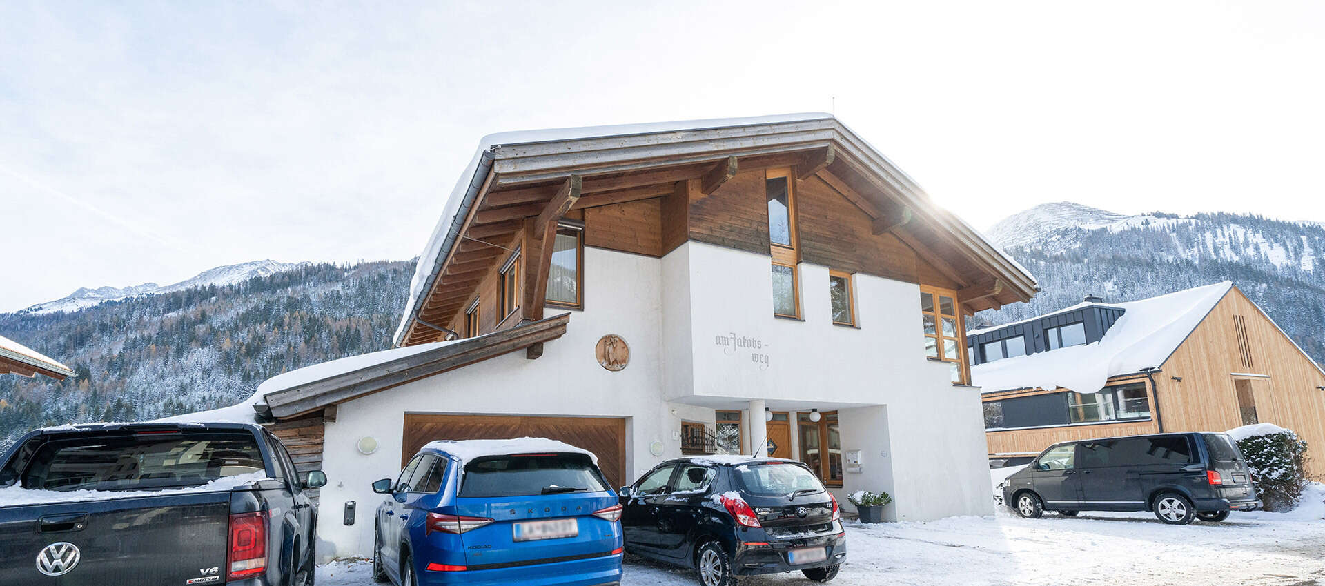 The house of Apart Arlberg in winter from outside
